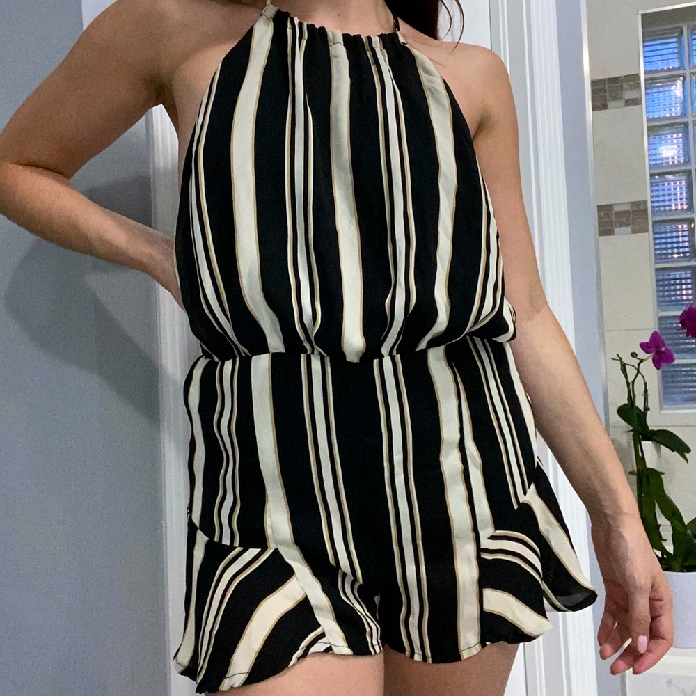 Blush boutique halter top romper with open back
